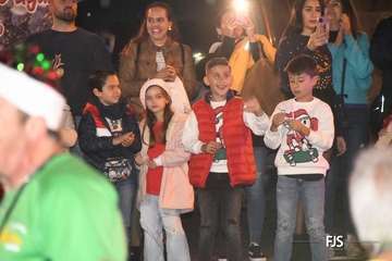 Papá Noel irrumpe en Lomo Magullo en un 4x4/FJS Fotografía.